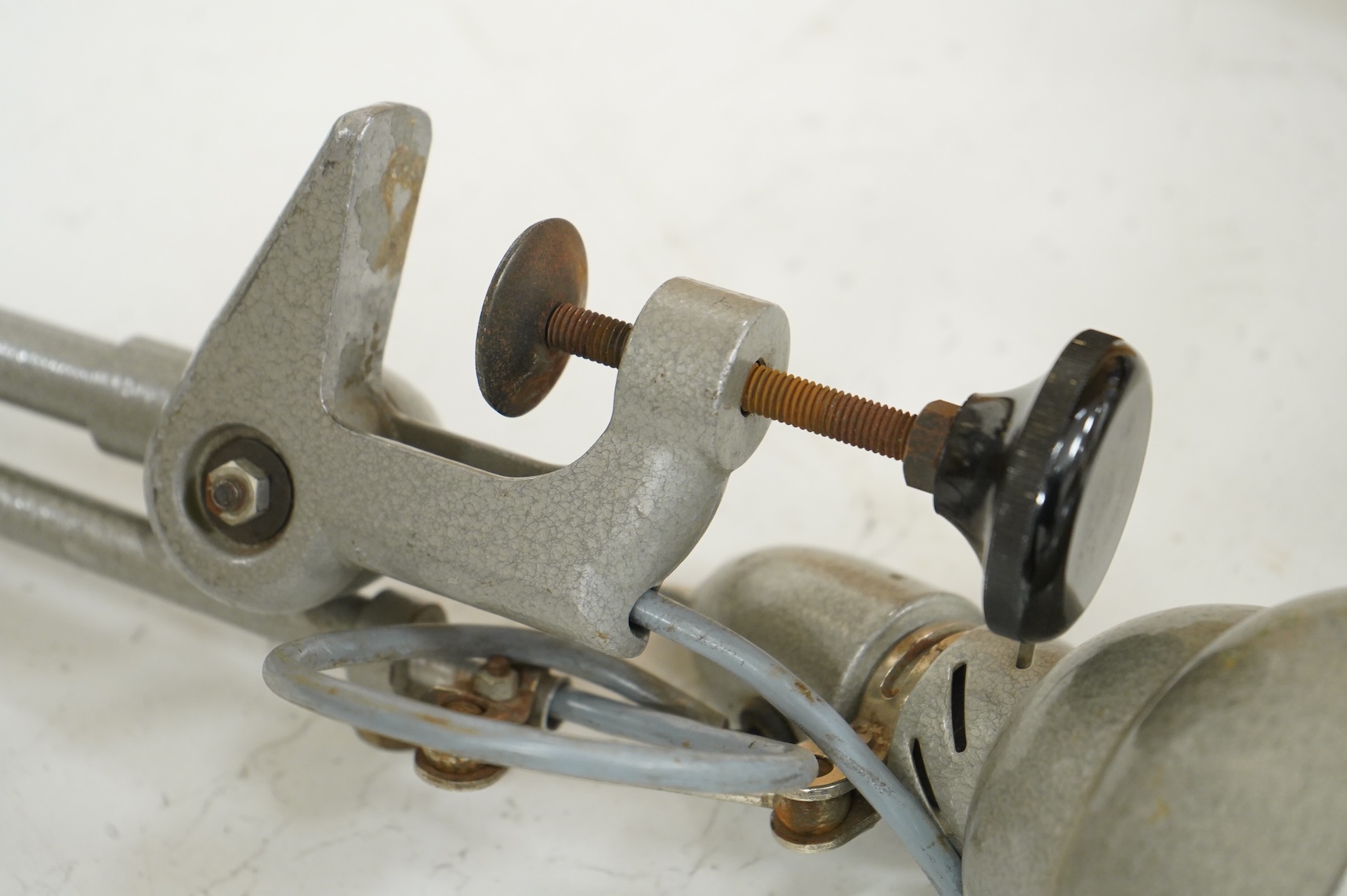 A Lumina industrial folding anglepoise lamp